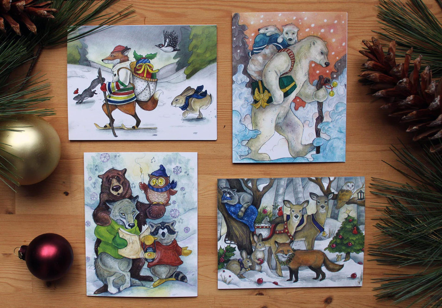 Set of 8 illustrated christmas cards in a woodland theme.