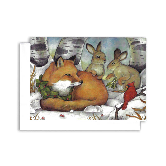 an illustrated woodland scene. A fox wearing a holly wreath around his neck, lays in the snow. Two rabbits stand with him. A cardinal sits close by and watches.
