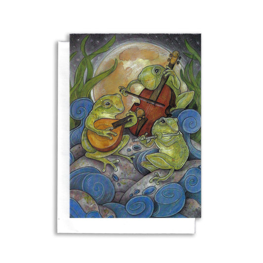 Delight someone with this enchanting greeting card featuring three whimsical frogs playing musical instruments under a glowing moon. Set against a serene background of swirling water and rocky perches, this card captures the magic of a springtime serenade.